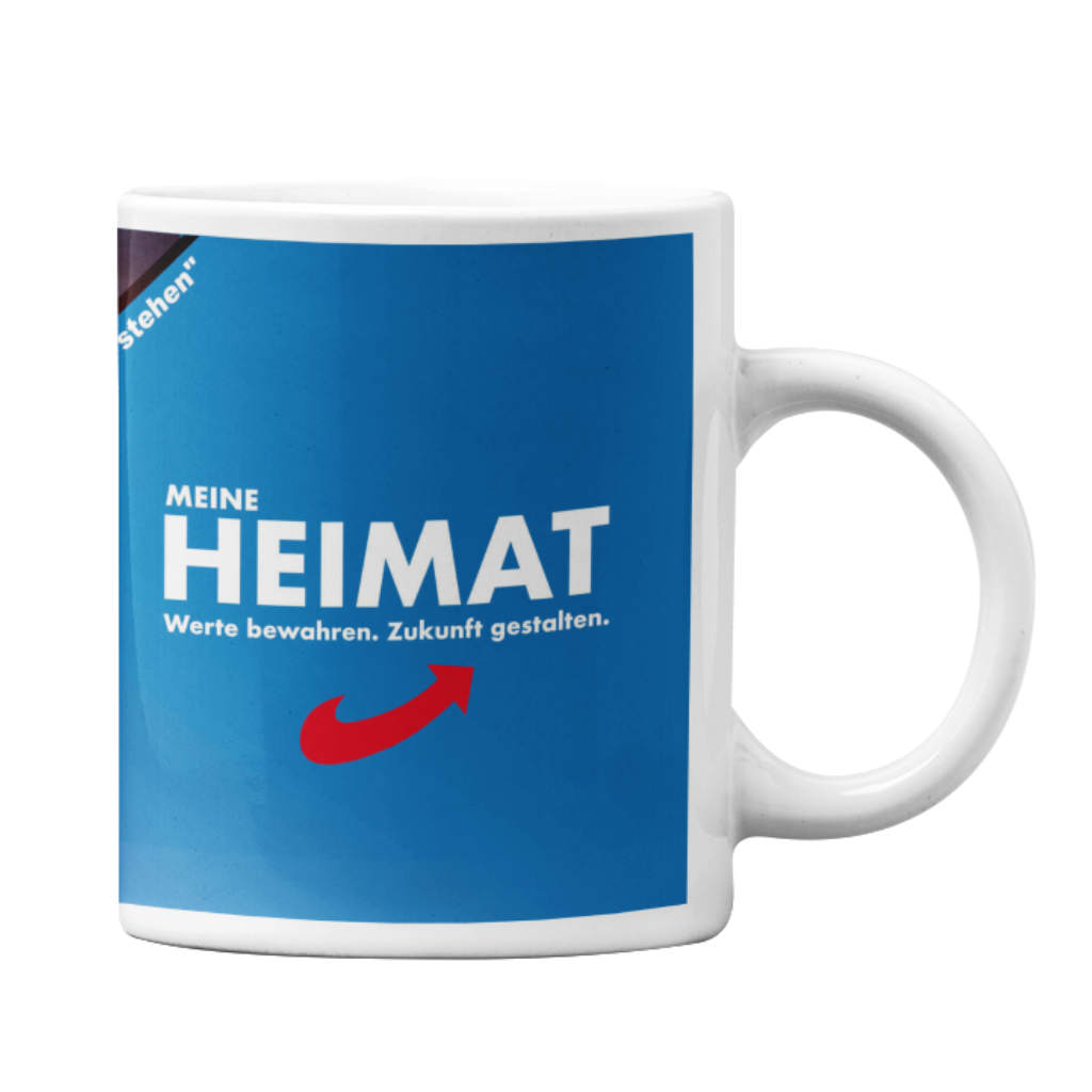 Kaffeebecher Heimat mit Schriftzug Meine Heimat, rotem Pfeil und blauem Motiv